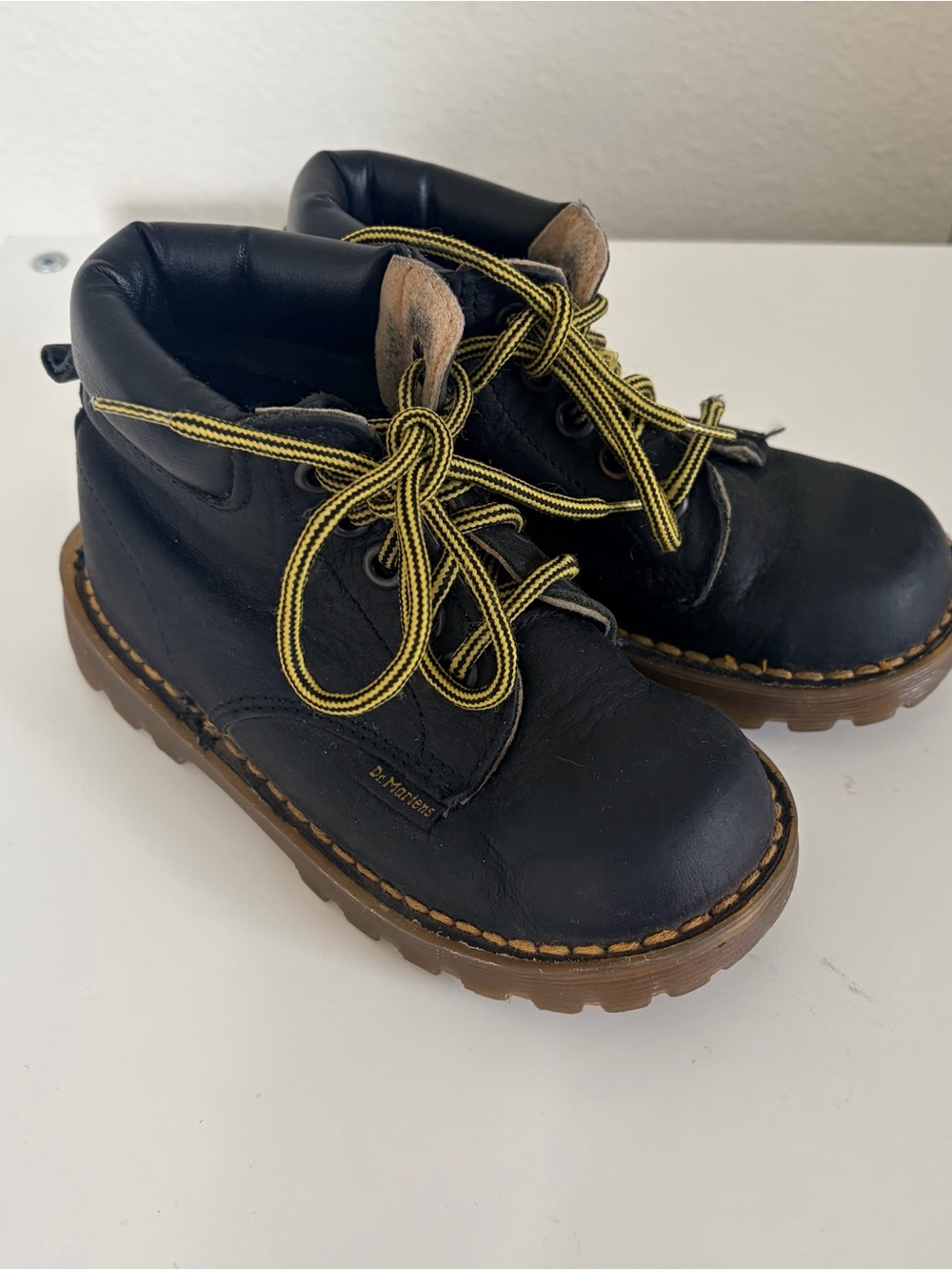 Kids Doc Martens Kids Black Leather Lace-Up Boots with Yellow Trim